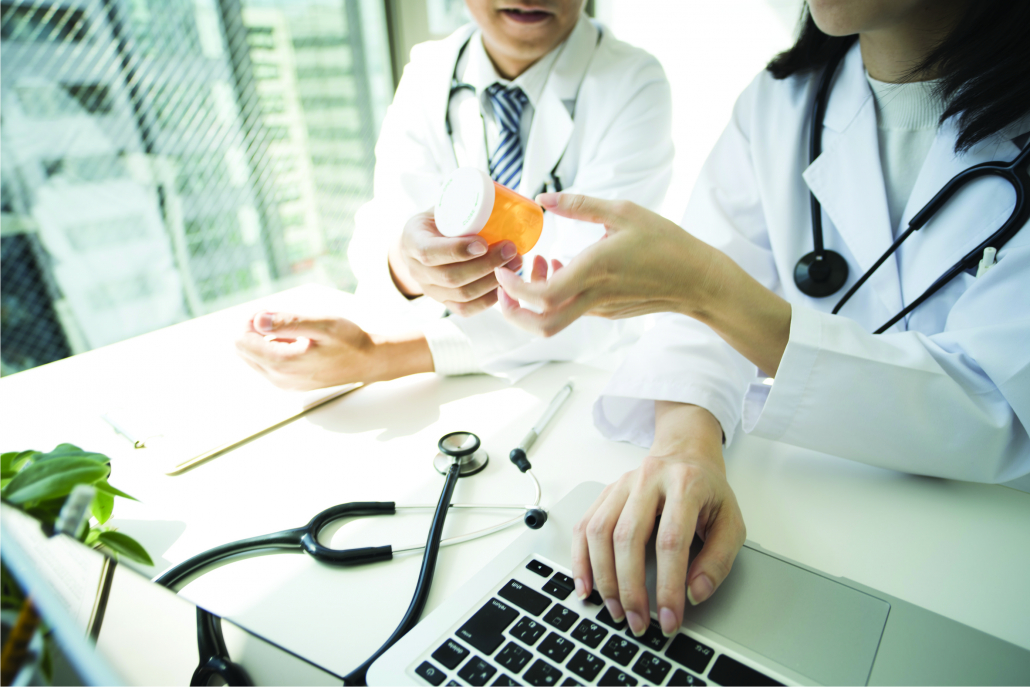 two doctors reviewing medication