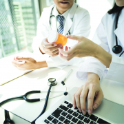 two doctors reviewing medication