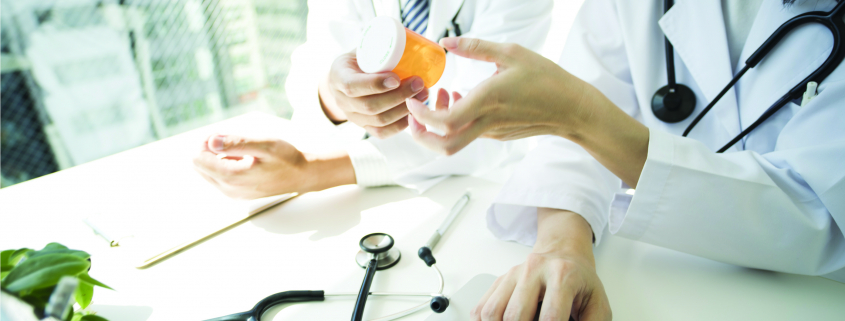 two doctors reviewing medication